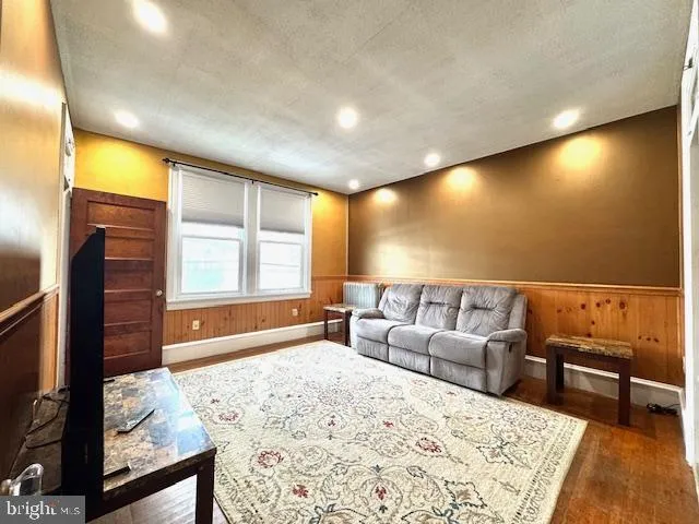 a view of a bathroom from a hallway
