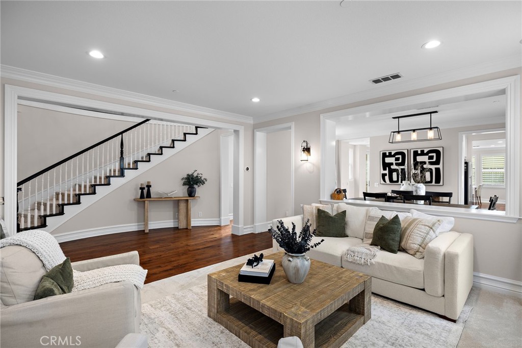 33 Christopher Street Ladera Ranch, CA 92694 - Photo 12 of 58 a living room with furniture and wooden floor