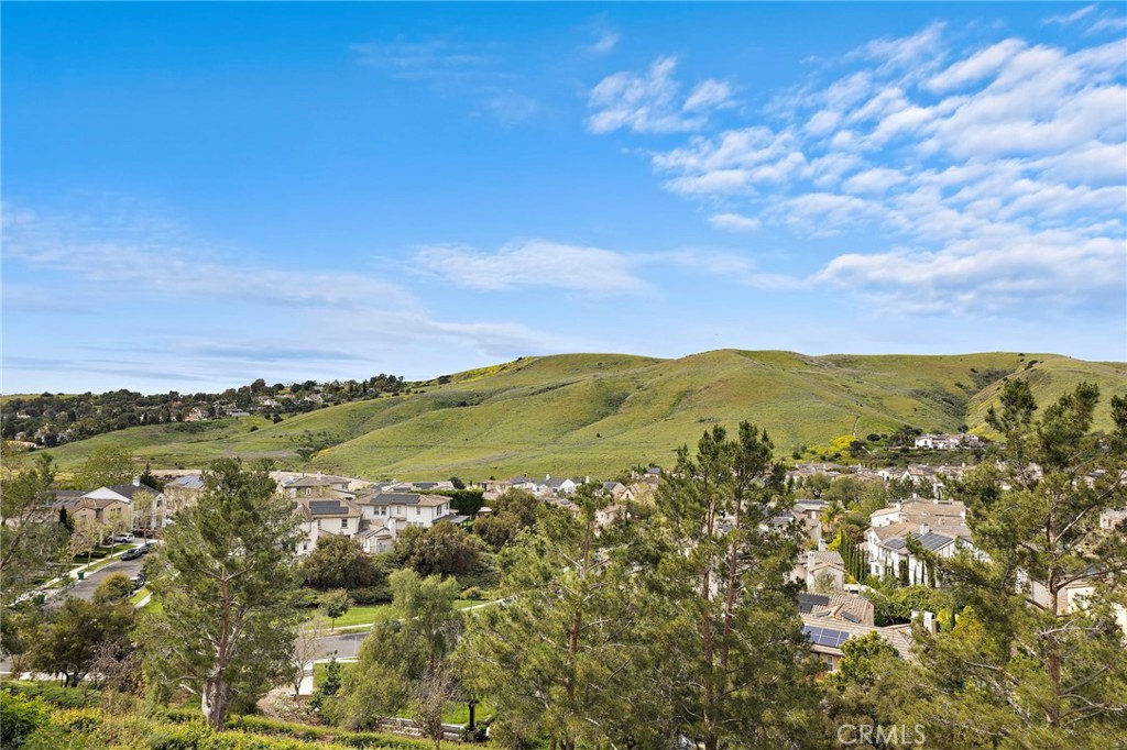 33 Christopher Street Ladera Ranch, CA 92694 - Photo 2 of 58 a view of a city with mountains in the background