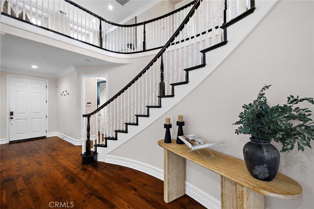 33 Christopher Street Ladera Ranch, CA 92694 - Photo 25 of 58 a view of entryway and hall with wooden floor