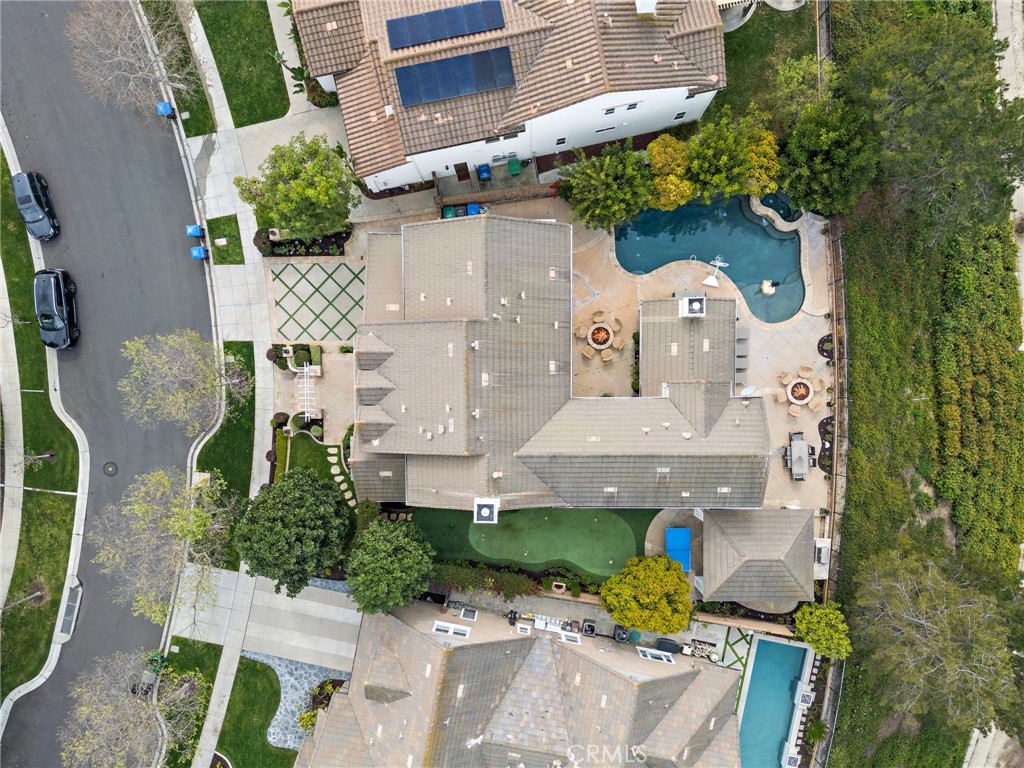 33 Christopher Street Ladera Ranch, CA 92694 - Photo 3 of 58 an aerial view of a house with yard garage and a patio
