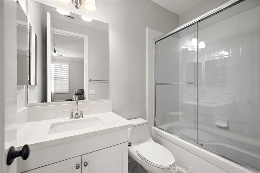 33 Christopher Street Ladera Ranch, CA 92694 - Photo 35 of 58 a bathroom with a sink toilet and shower