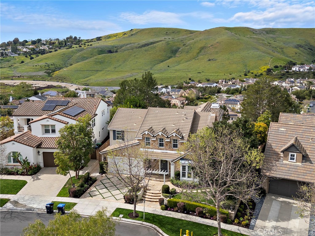 33 Christopher Street Ladera Ranch, CA 92694 - Photo 51 of 58 an aerial view of residential houses with outdoor space and trees
