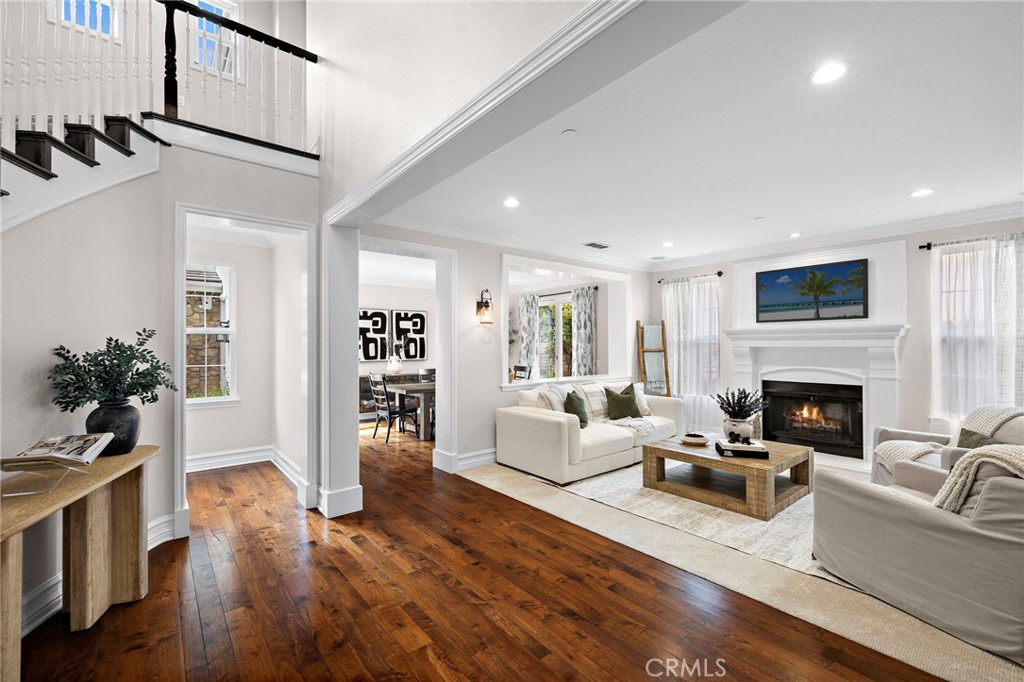 33 Christopher Street Ladera Ranch, CA 92694 - Photo 10 of 58 a living room with furniture and a fireplace