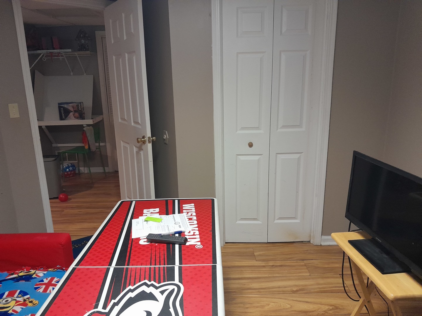 821 Perry Drive Algonquin, IL 60102 - Photo 15 of 21 a room with furniture and a flat screen tv