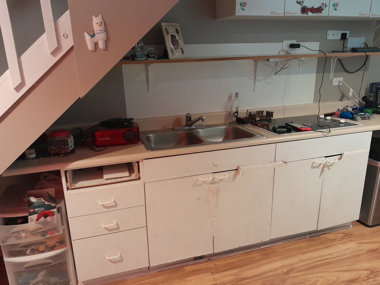 821 Perry Drive Algonquin, IL 60102 - Photo 17 of 21 a kitchen with white cabinets and a sink