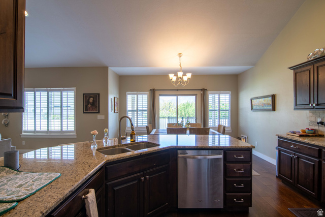 646 East 1400th Street North Mapleton, UT 84664 - Photo 16 of 78 Spacious kitchen island featuring a double basin sink, stainless steel dishwasher, and granite countertops