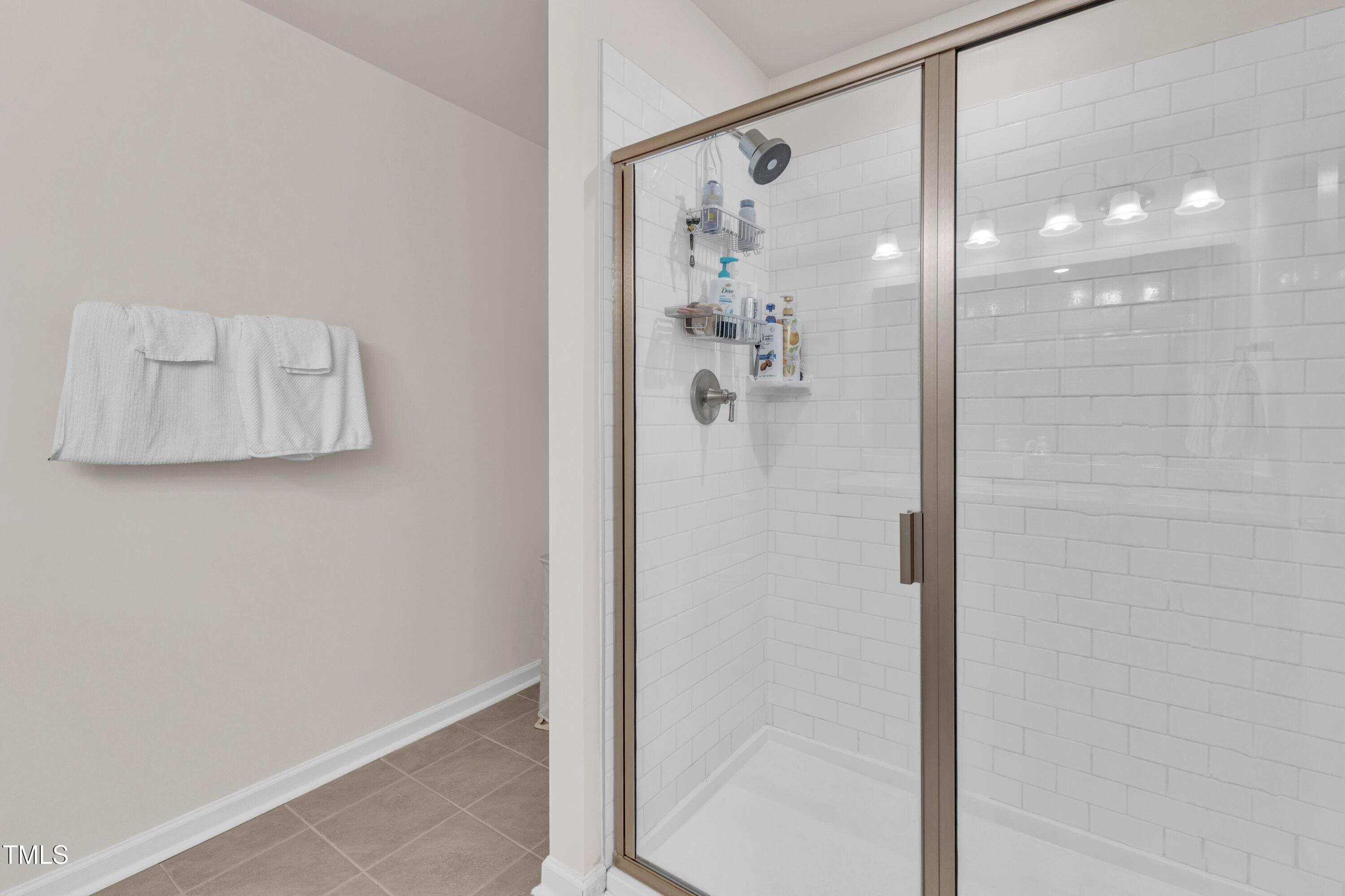 3417 Dragonfly River Raleigh, NC 27604 - Photo 31 of 52 a bathroom with a shower