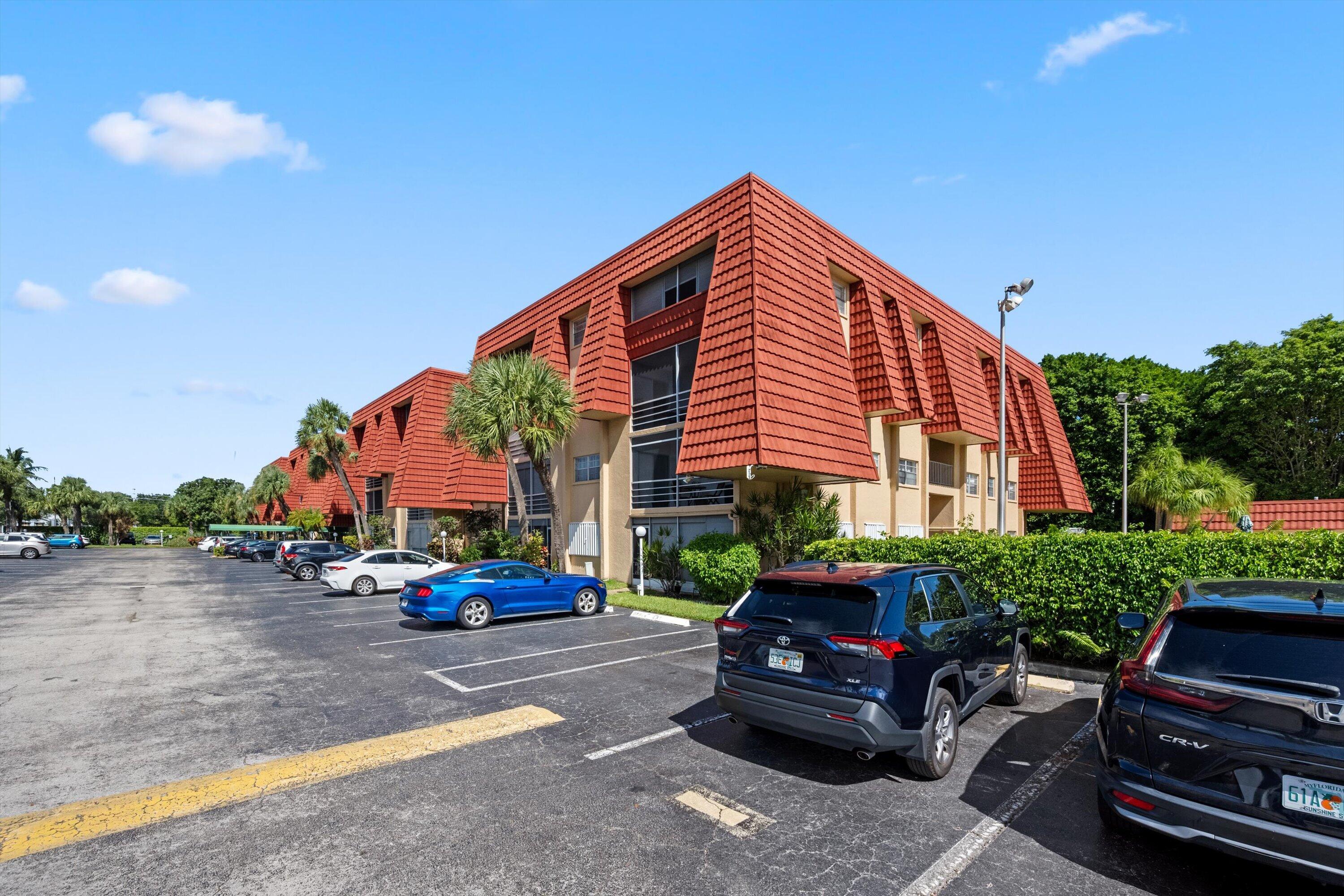 22615 Southwest 66th Avenue, Unit 208 Boca Raton, FL 33428 - Photo 29 of 29 Parking Lot