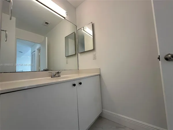 a view of hallway with washer and dryer