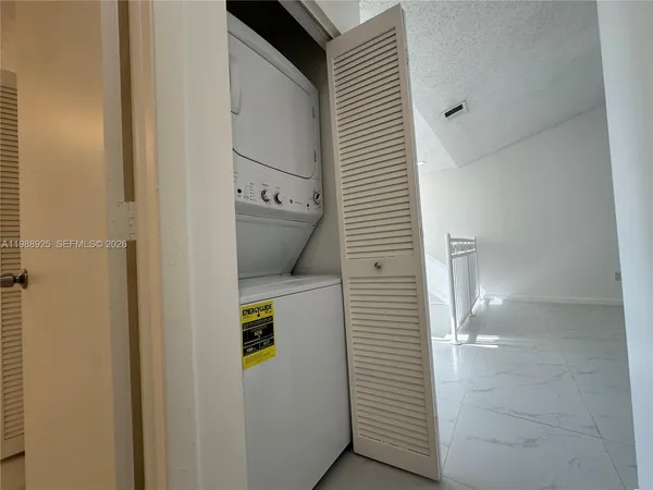 a view of a large window with wooden floor
