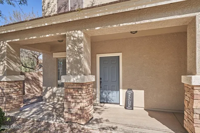 a view of a hallway with windows