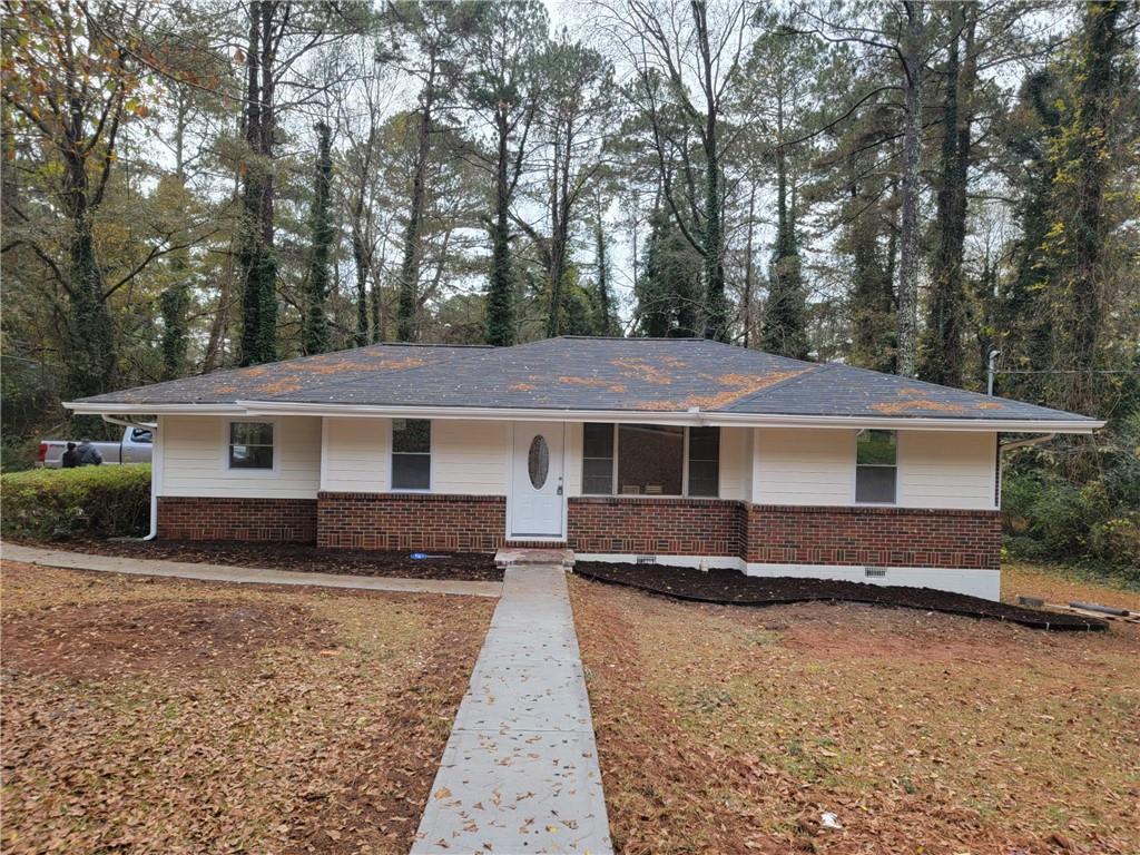 3403 Jackson Drive Decatur, GA 30032 - Photo 1 of 1 a front view of a house with a yard