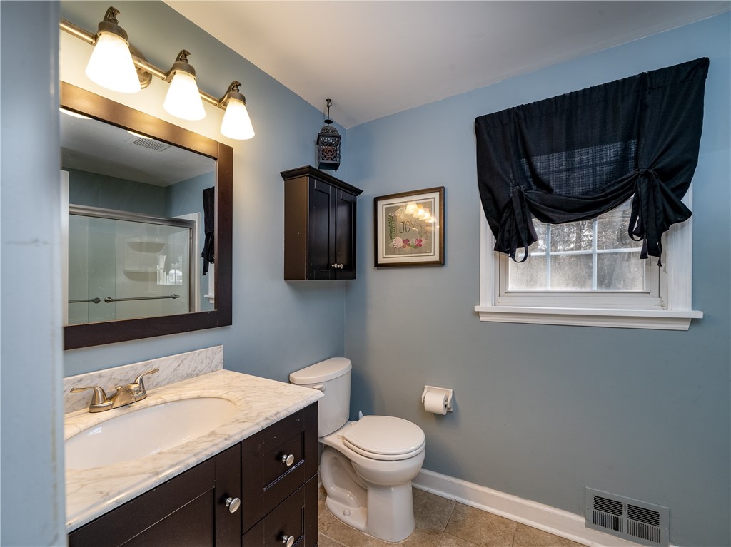 52 Lambeth Loop Perinton, NY 14450 - Photo 20 of 34 Main bath looking back from doorway, towards sink