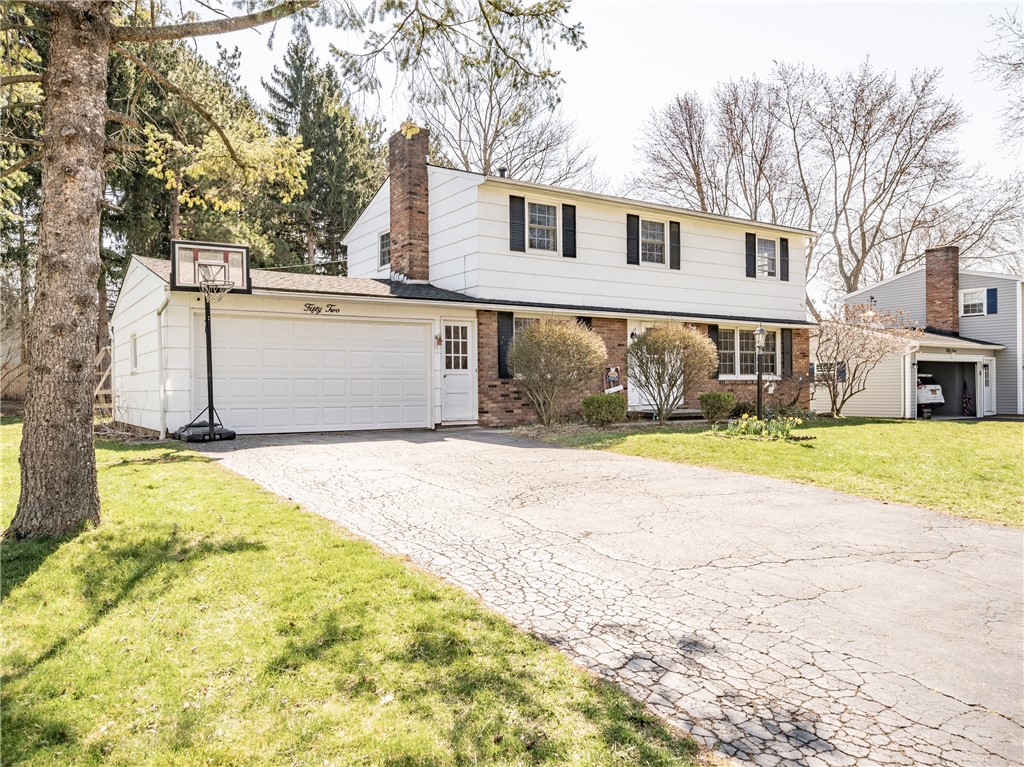 52 Lambeth Loop Perinton, NY 14450 - Photo 3 of 34 Left hand elevation of frontage.
