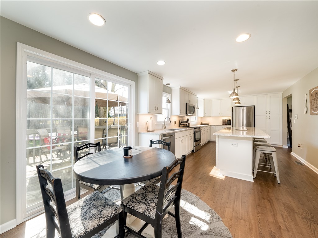 52 Lambeth Loop Perinton, NY 14450 - Photo 10 of 34 Dinette area looking back into kitchen and all cou