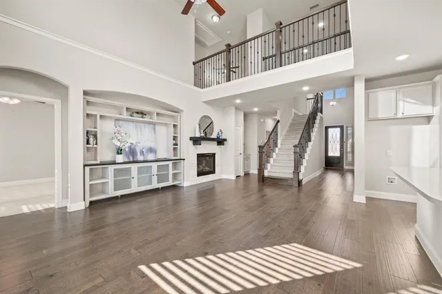 a view of an entryway with wooden floor