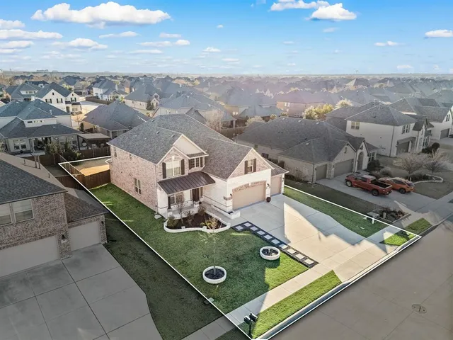 an aerial view of a house roof deck