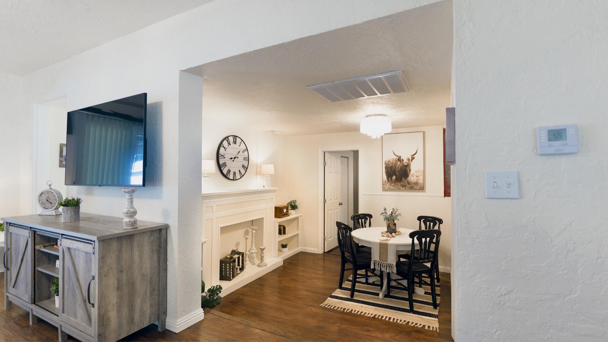 20577 Sunset Lane Redding, CA 96002 - Photo 12 of 29 a living room with furniture and a fireplace