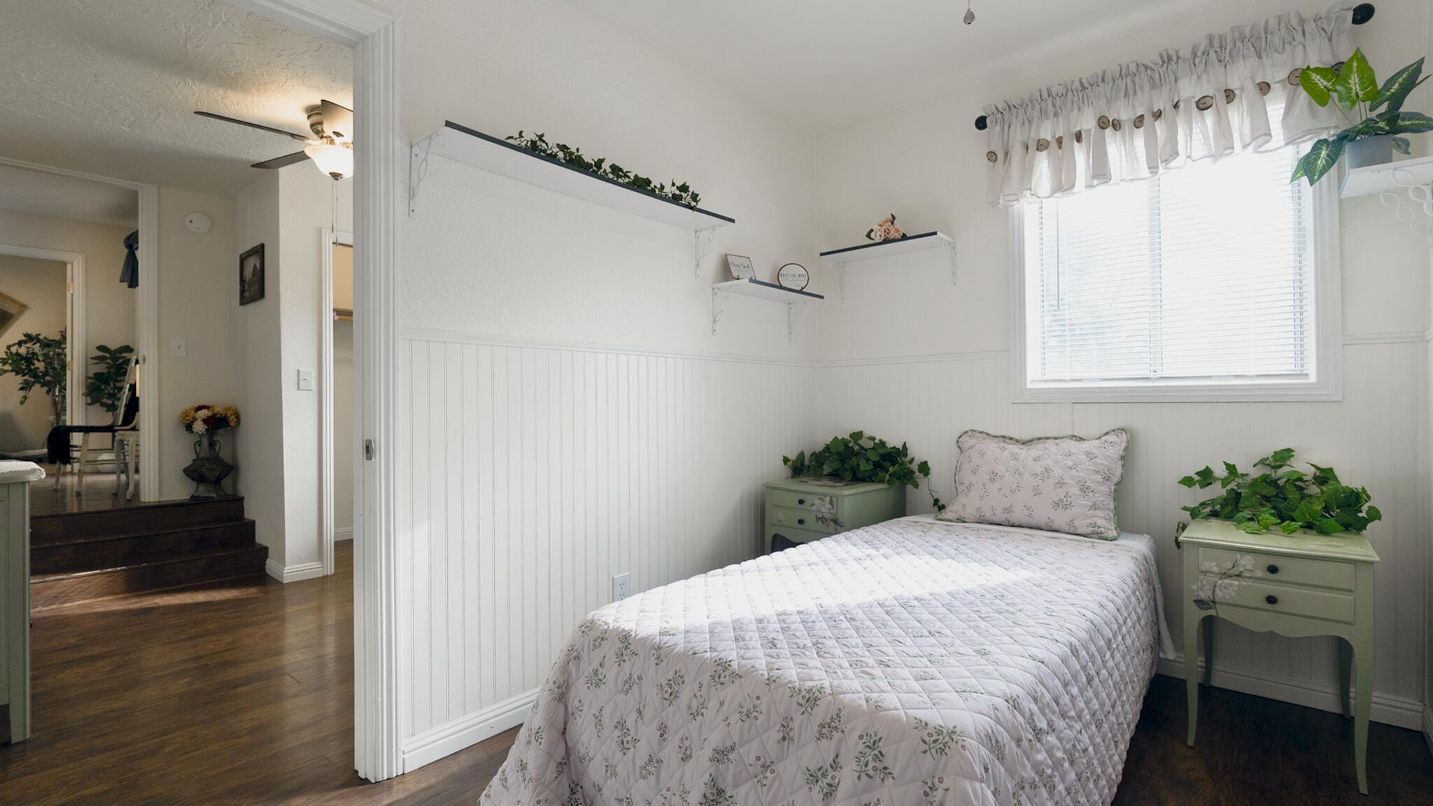 20577 Sunset Lane Redding, CA 96002 - Photo 16 of 29 a bedroom with a bed and a window