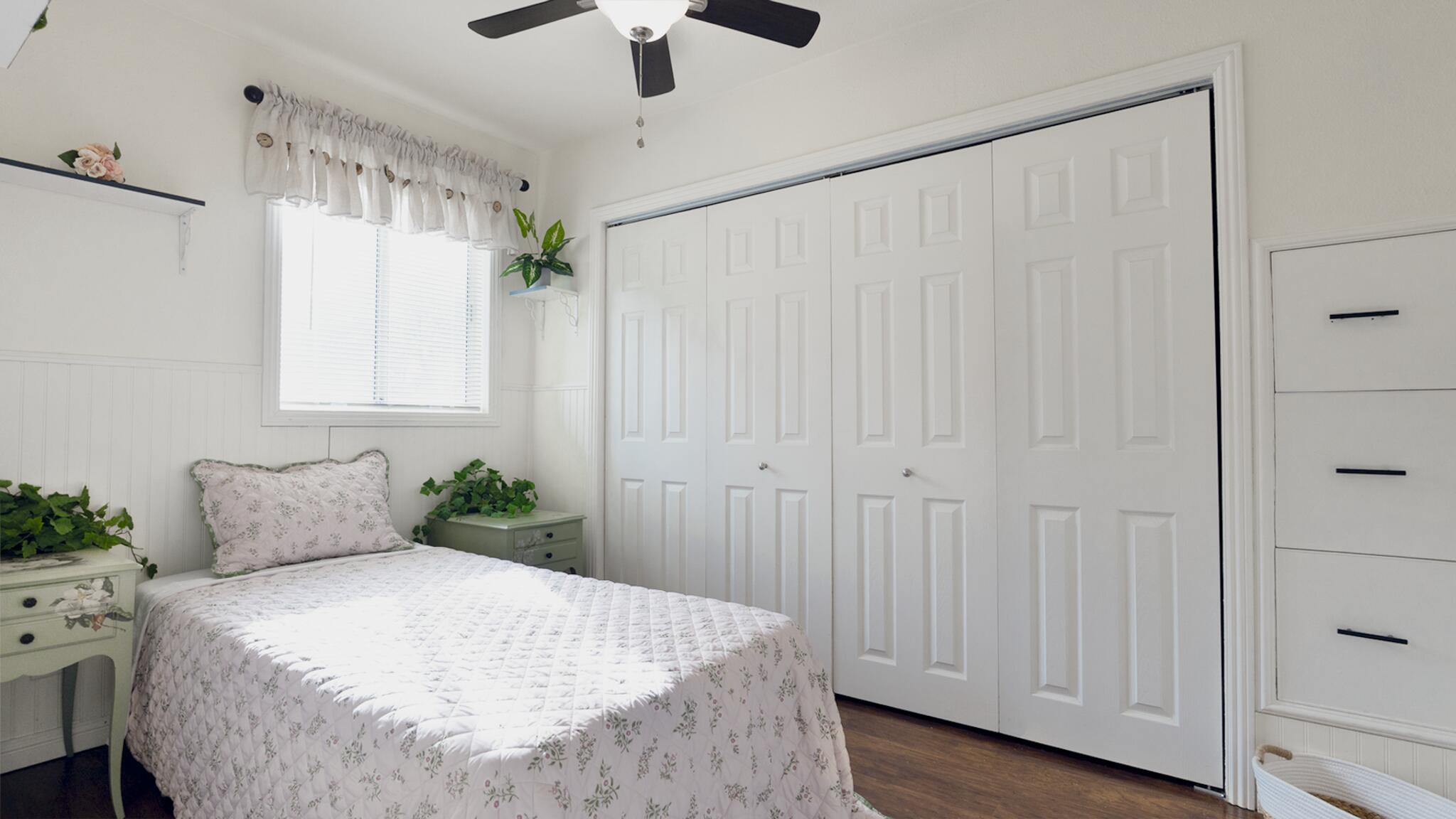 20577 Sunset Lane Redding, CA 96002 - Photo 17 of 29 a bedroom with a bed and a window