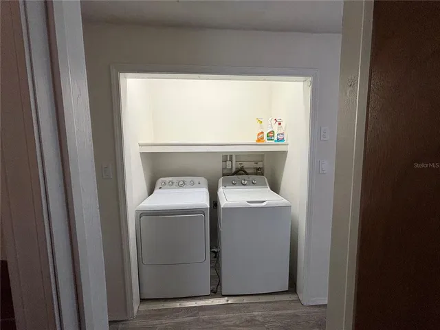 a utility room with dryer and washer
