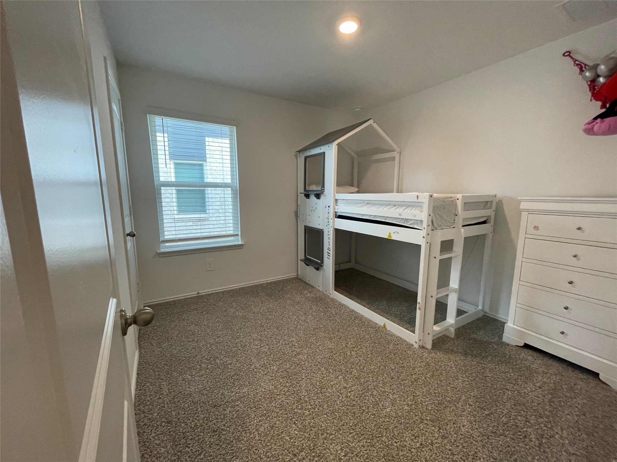 23811 Desert Brush Ct Spring Spring, TX 77373 - Photo 15 of 24 a view of an empty room with a window