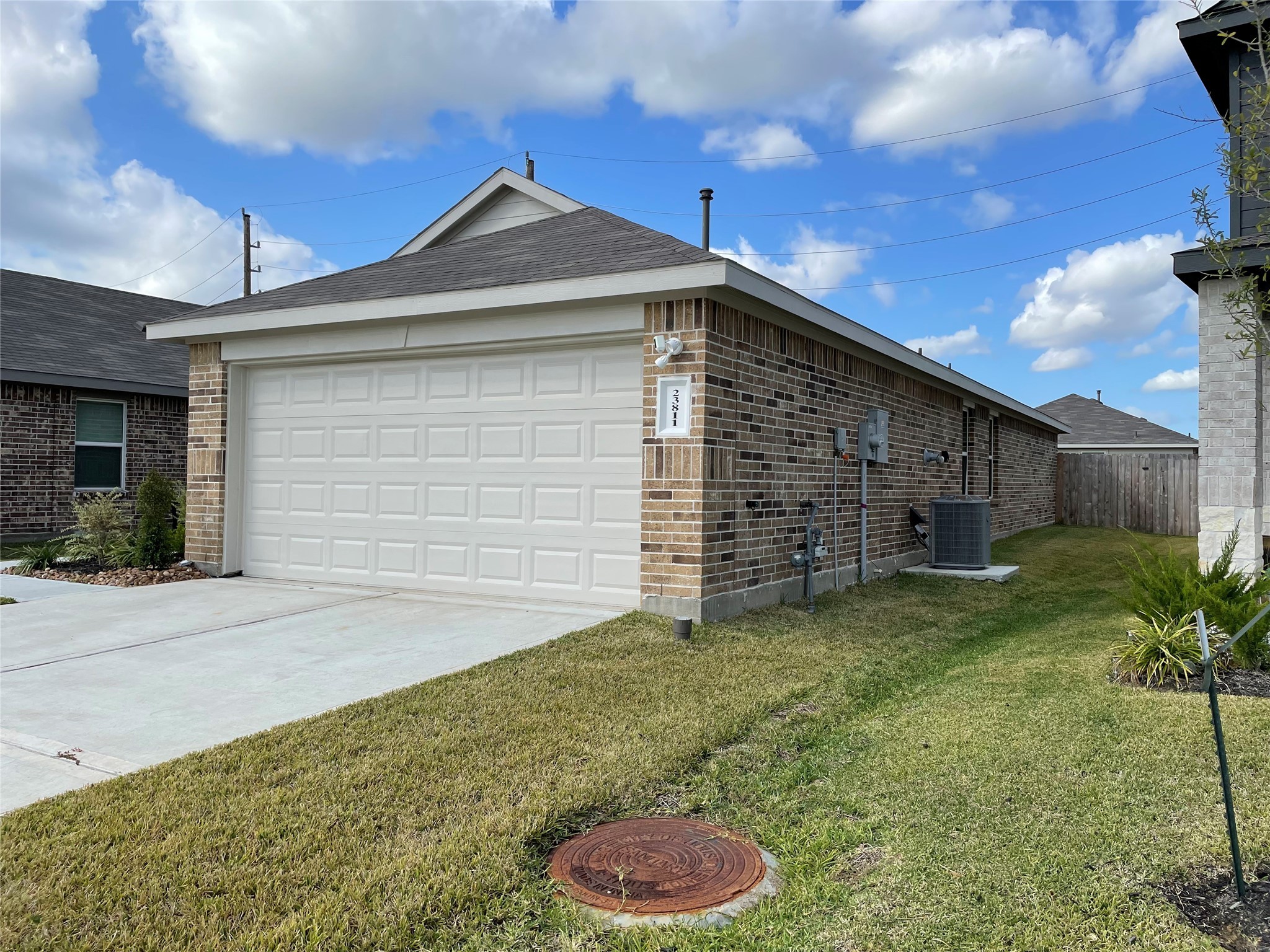23811 Desert Brush Ct Spring Spring, TX 77373 - Photo 22 of 24 a front view of a house with a yard