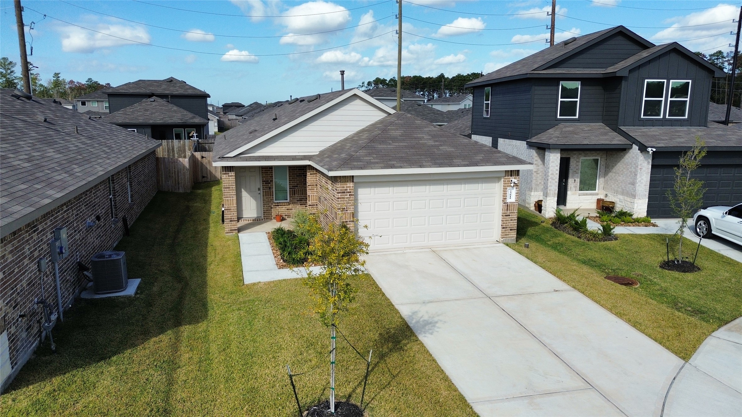 23811 Desert Brush Ct Spring Spring, TX 77373 - Photo 23 of 24 a front view of a house with garden