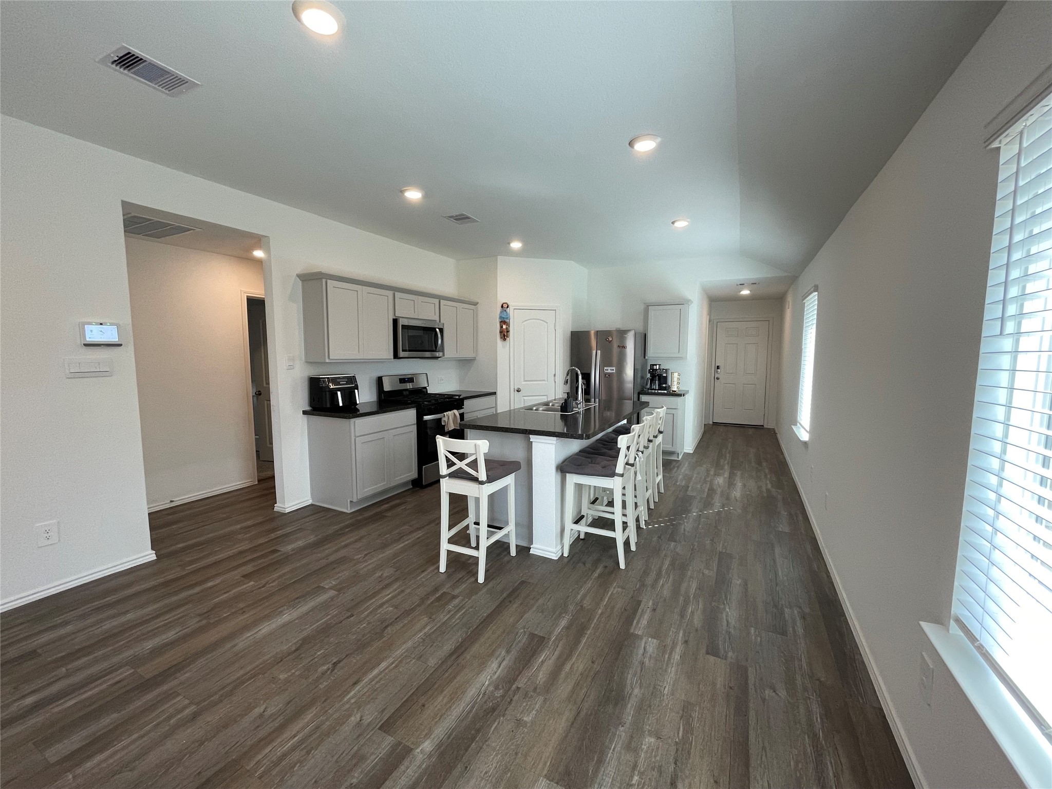 23811 Desert Brush Ct Spring Spring, TX 77373 - Photo 9 of 24 a kitchen with a table and chairs in it