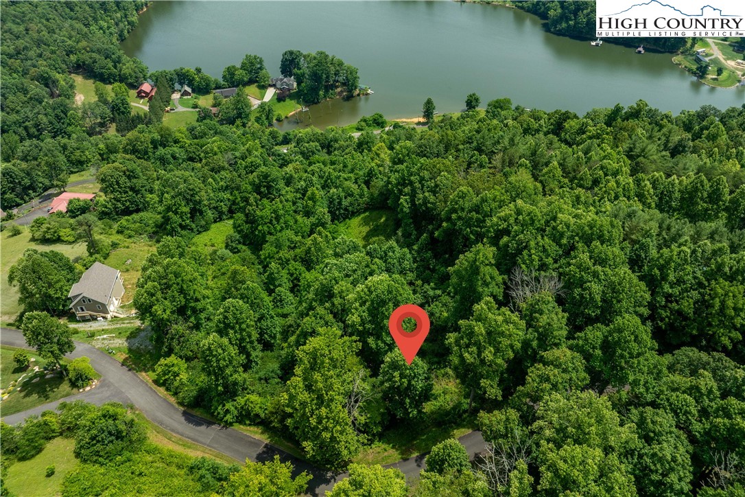 Lot 11 Lake Ridge Butler, TN 37640 - Photo 11 of 20 an aerial view of a house with a yard and lake view