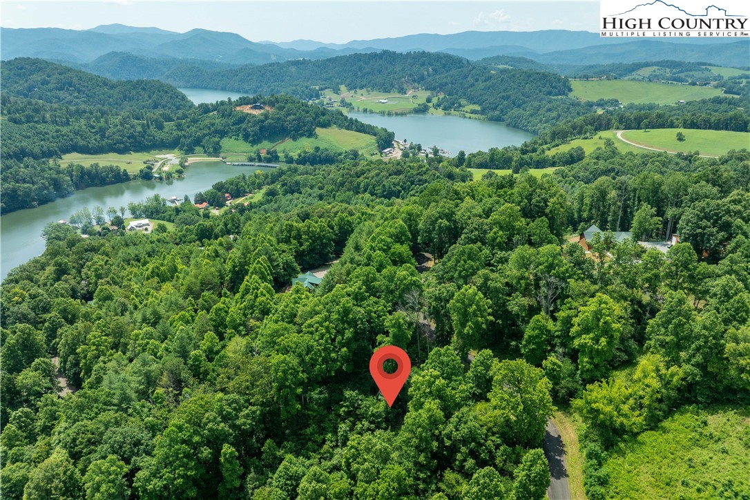 Lot 11 Lake Ridge Butler, TN 37640 - Photo 7 of 20 a view of a lake with a mountain in the background