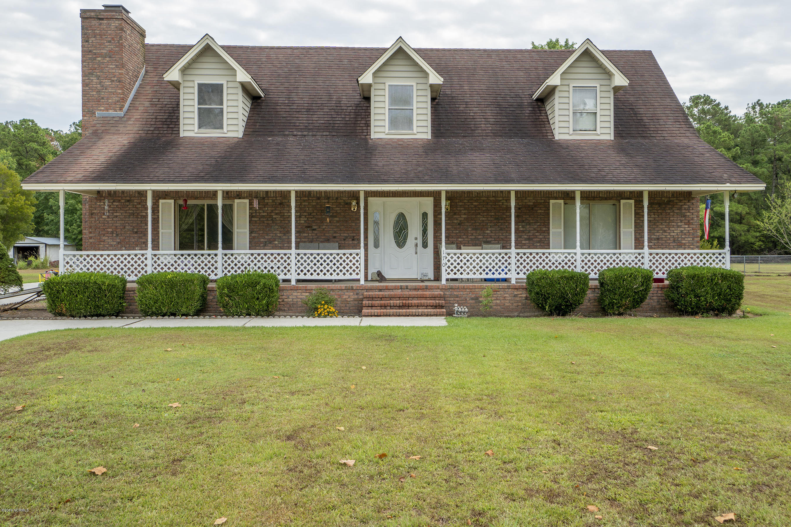Massive Covered Front Porch