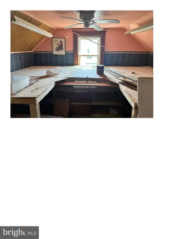 a black and white photo of a living room