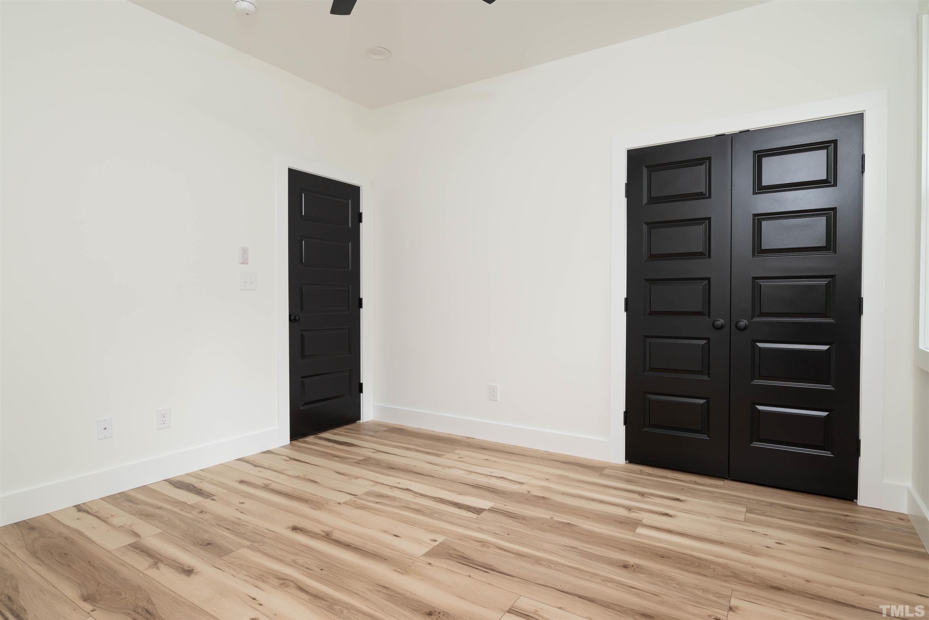 3602 Moriah Road Rougemont, NC 27572 - Photo 12 of 26 a view of a bedroom with closet and cabinet