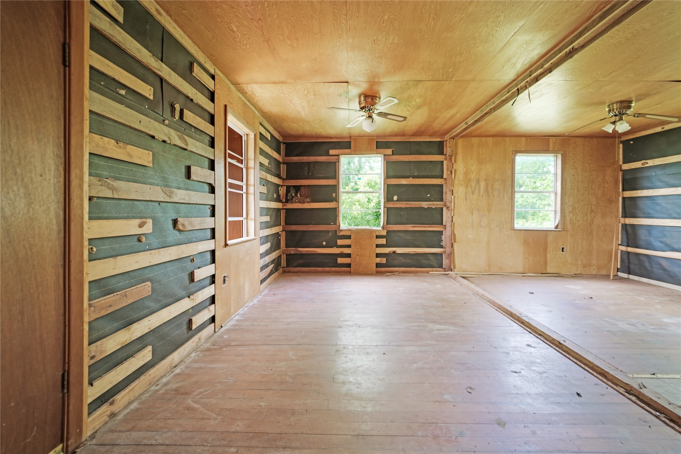 691 County Road 1333 Liberty, TX 77575 - Photo 19 of 24 a view of an empty room with a window