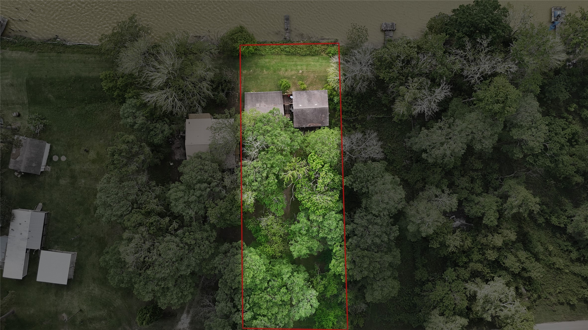 691 County Road 1333 Liberty, TX 77575 - Photo 2 of 24 an aerial view of a house with outdoor space