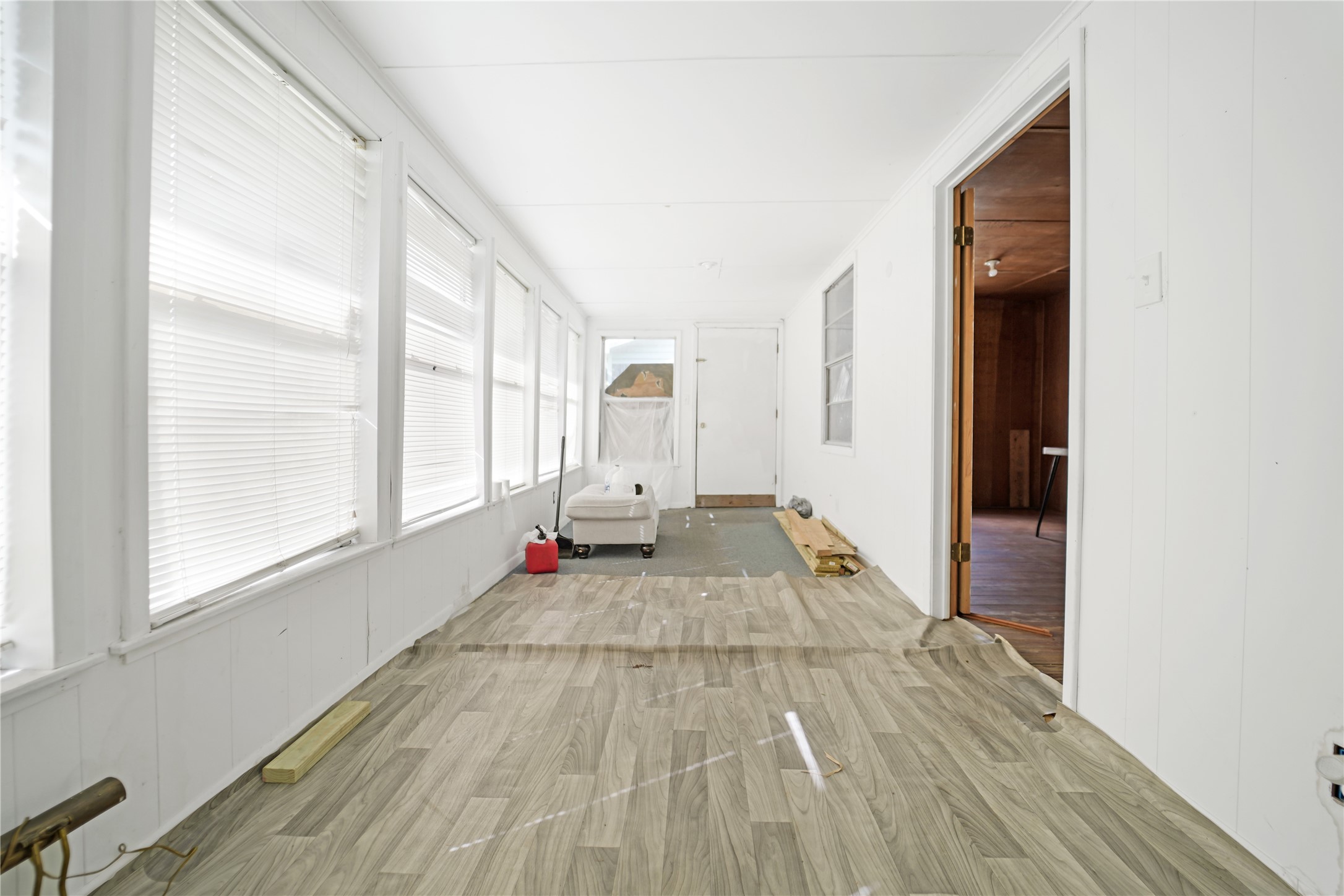 691 County Road 1333 Liberty, TX 77575 - Photo 7 of 24 a view of a bedroom with wooden floor and window