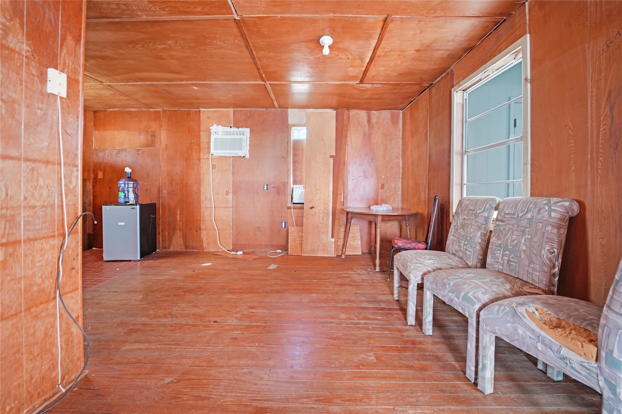 691 County Road 1333 Liberty, TX 77575 - Photo 9 of 24 a living room with furniture and a large window