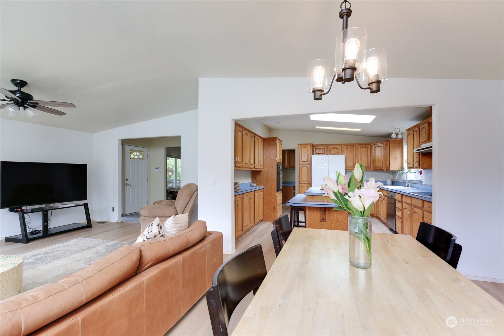 3374 Best Road Oak Harbor, WA 98277 - Photo 12 of 39 a living room with furniture and a flat screen tv