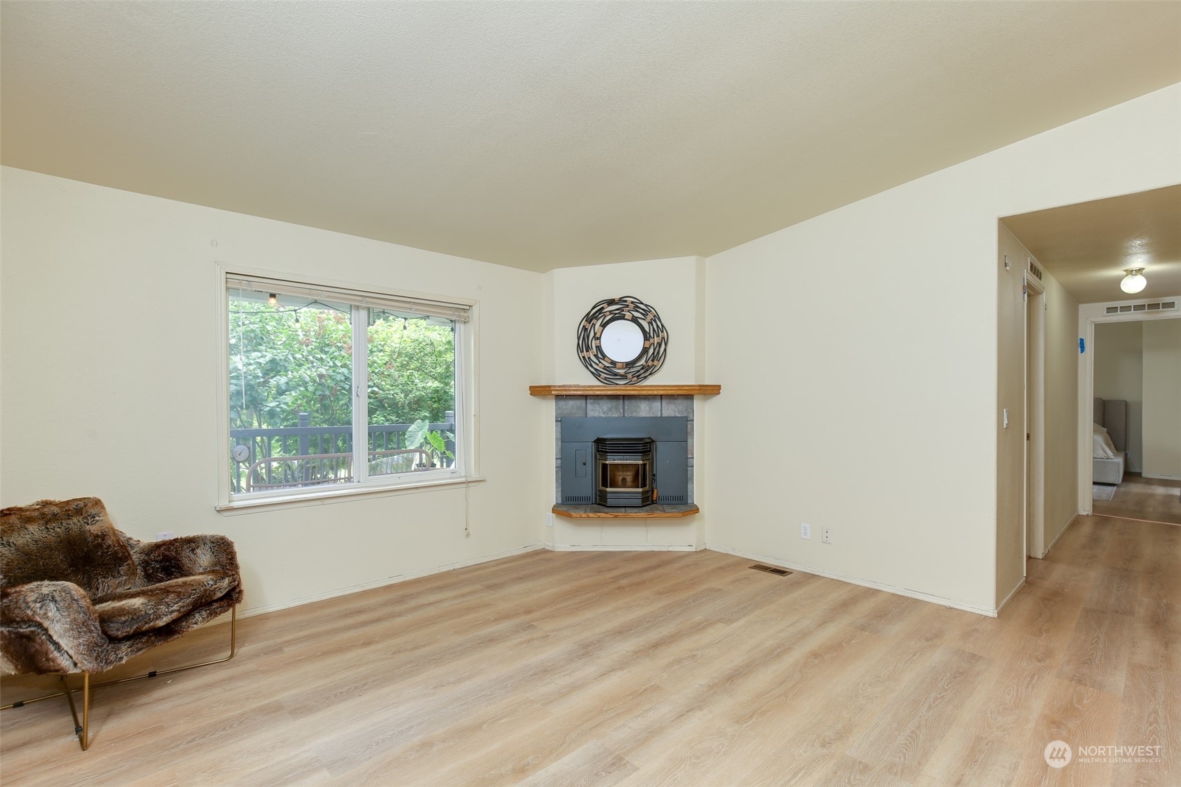 3374 Best Road Oak Harbor, WA 98277 - Photo 16 of 39 a view of an empty room with wooden floor and a window