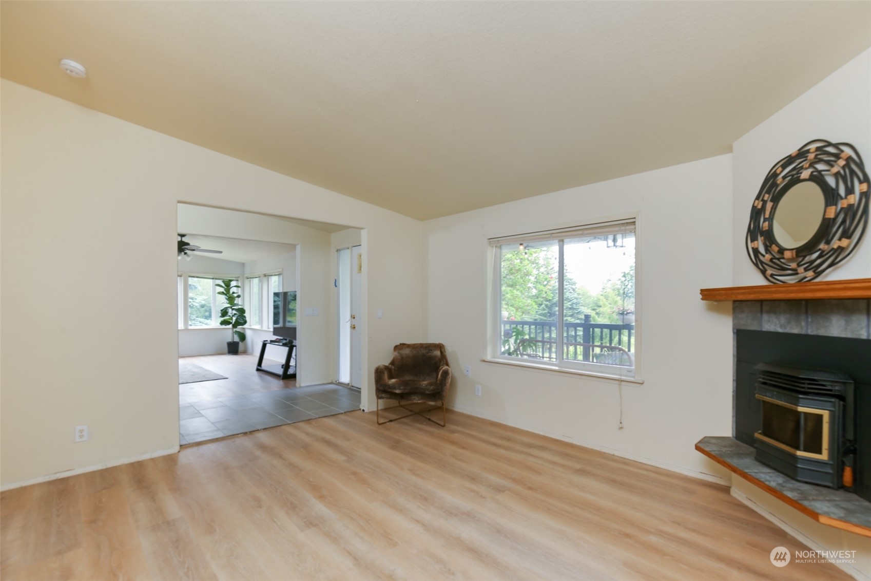 3374 Best Road Oak Harbor, WA 98277 - Photo 17 of 39 a view of a livingroom with a fireplace and window