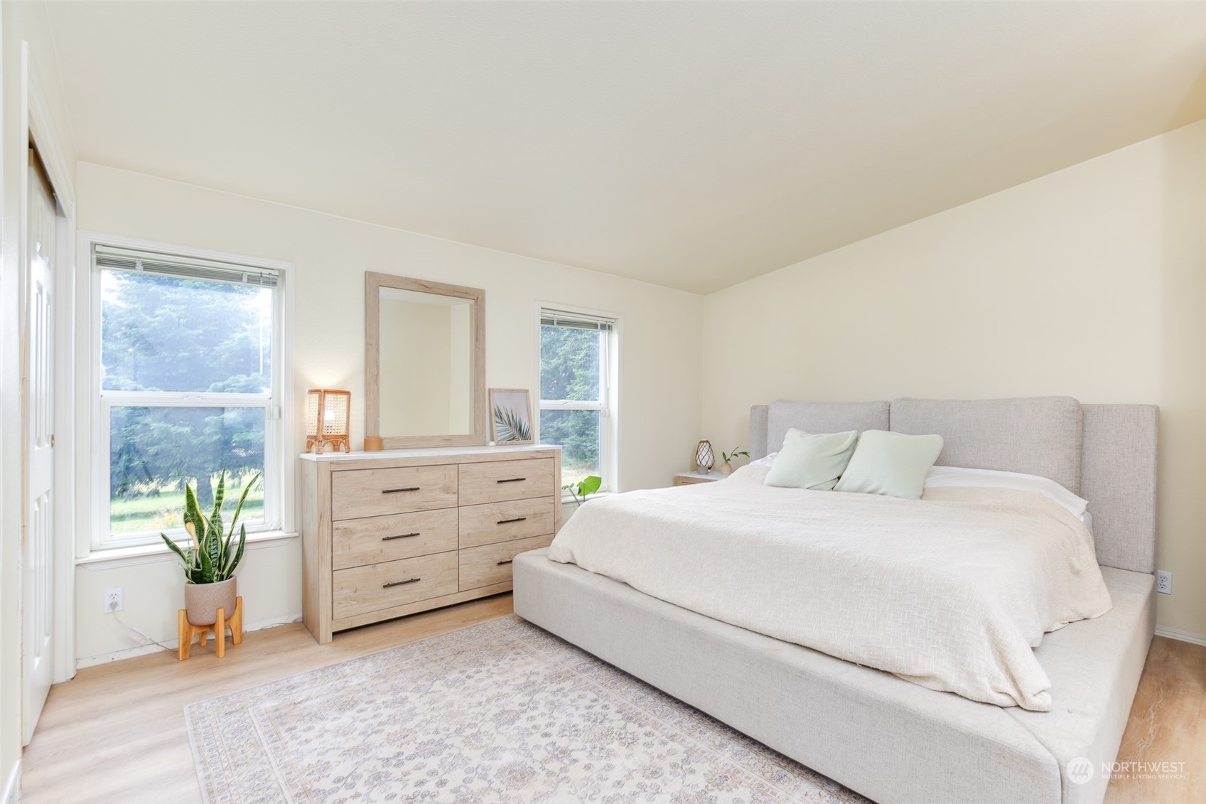 3374 Best Road Oak Harbor, WA 98277 - Photo 20 of 39 a bedroom with a bed and a dresser