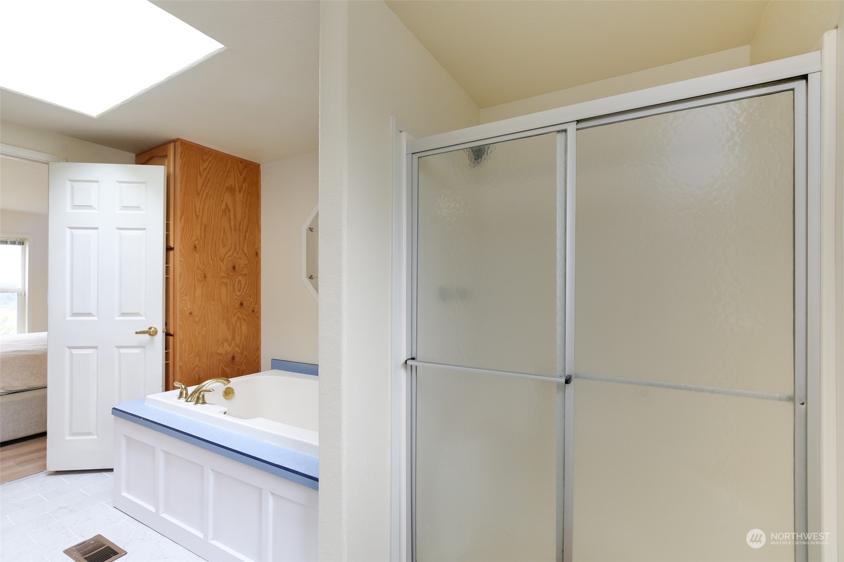 3374 Best Road Oak Harbor, WA 98277 - Photo 23 of 39 a bathroom with a bathtub and a shower