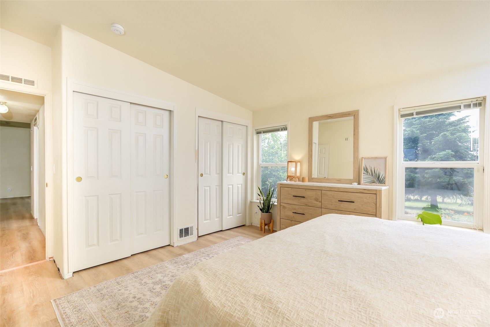 3374 Best Road Oak Harbor, WA 98277 - Photo 24 of 39 a bedroom with a bed and a cabinets