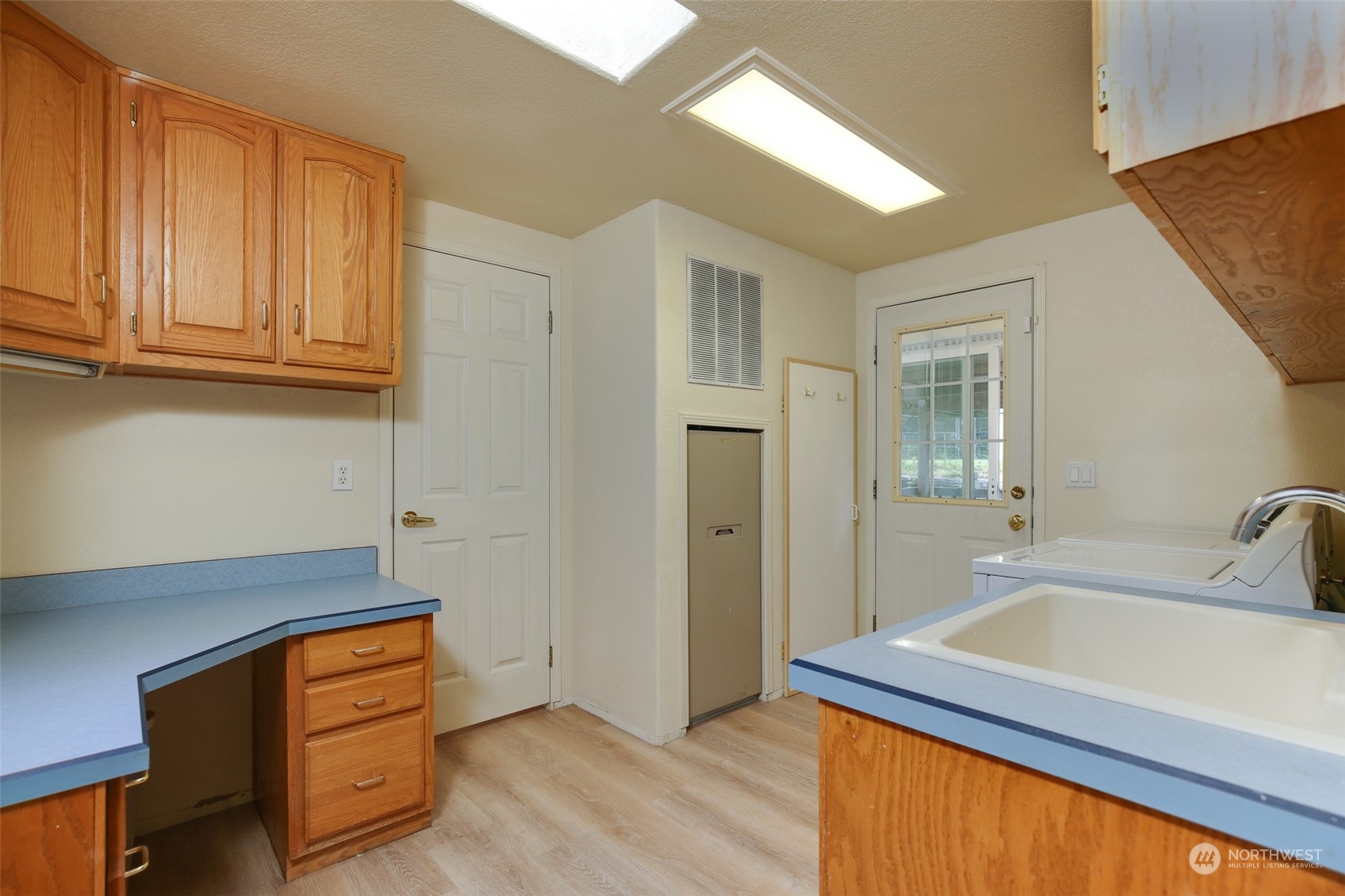 3374 Best Road Oak Harbor, WA 98277 - Photo 26 of 39 a room with furniture and wooden floor
