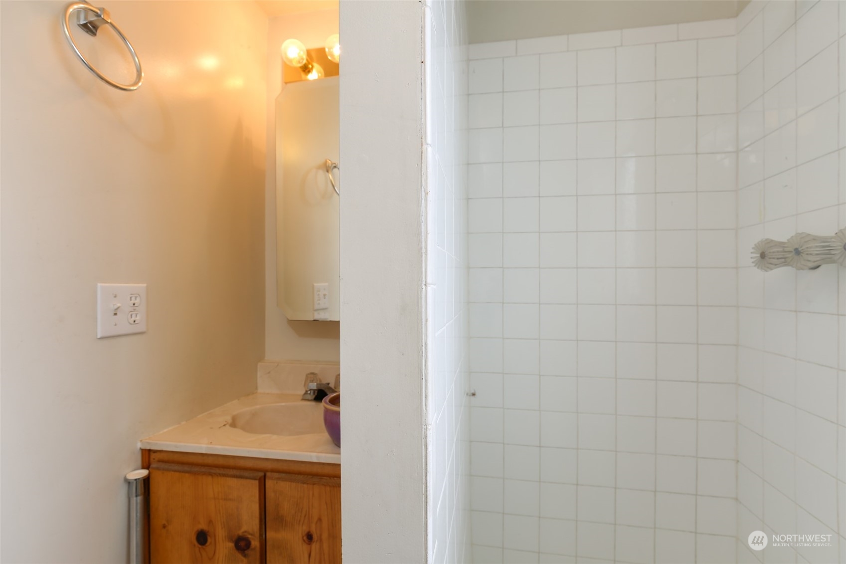3374 Best Road Oak Harbor, WA 98277 - Photo 32 of 39 a bathroom with a sink and mirror