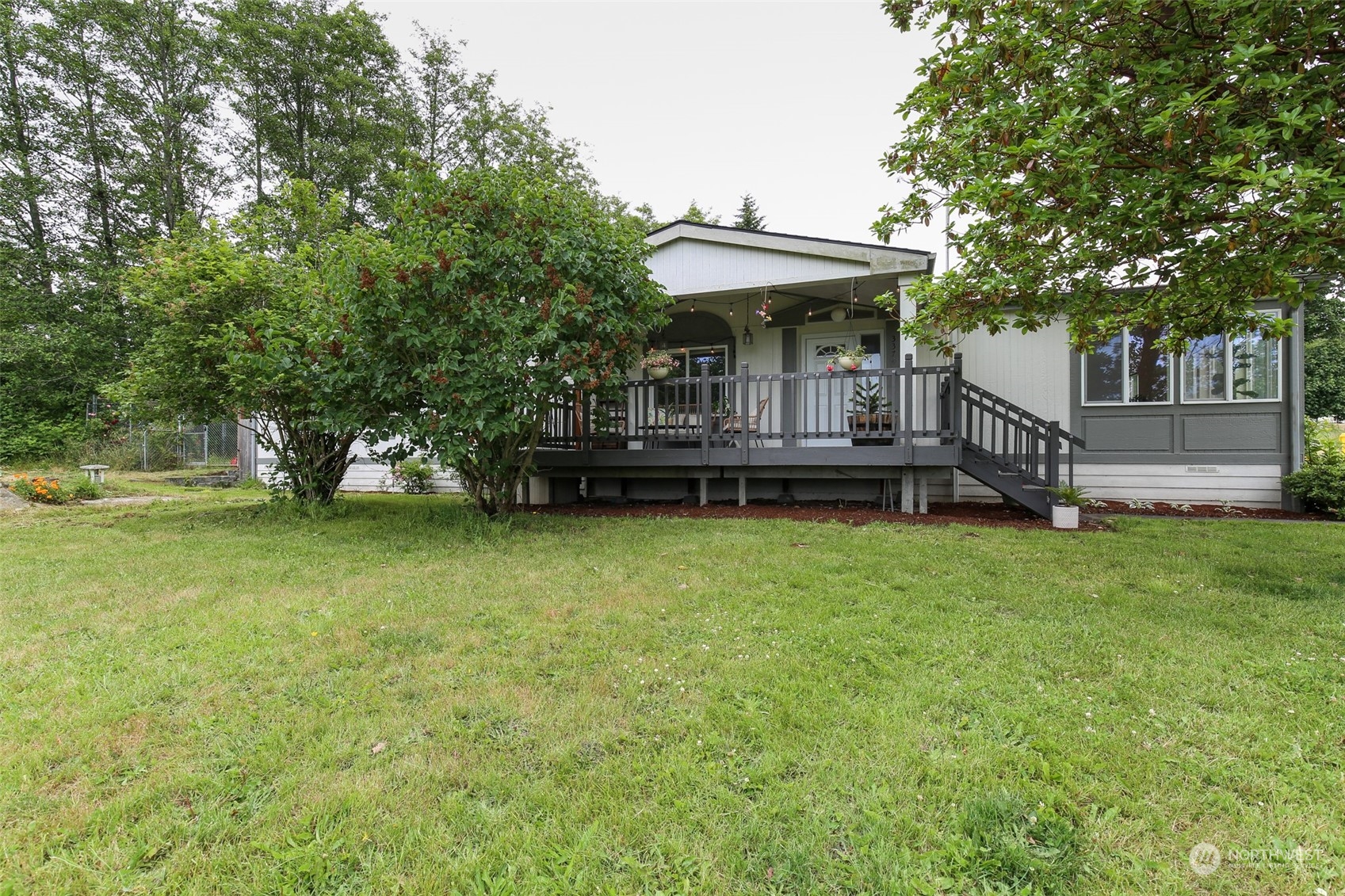 3374 Best Road Oak Harbor, WA 98277 - Photo 6 of 39 a view of a house with a yard