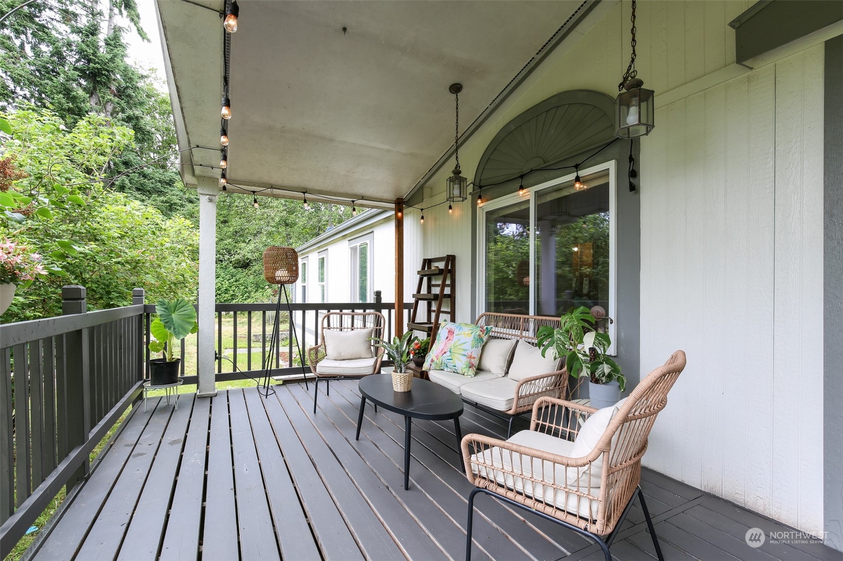 3374 Best Road Oak Harbor, WA 98277 - Photo 7 of 39 a balcony with wooden floor and outdoor seating