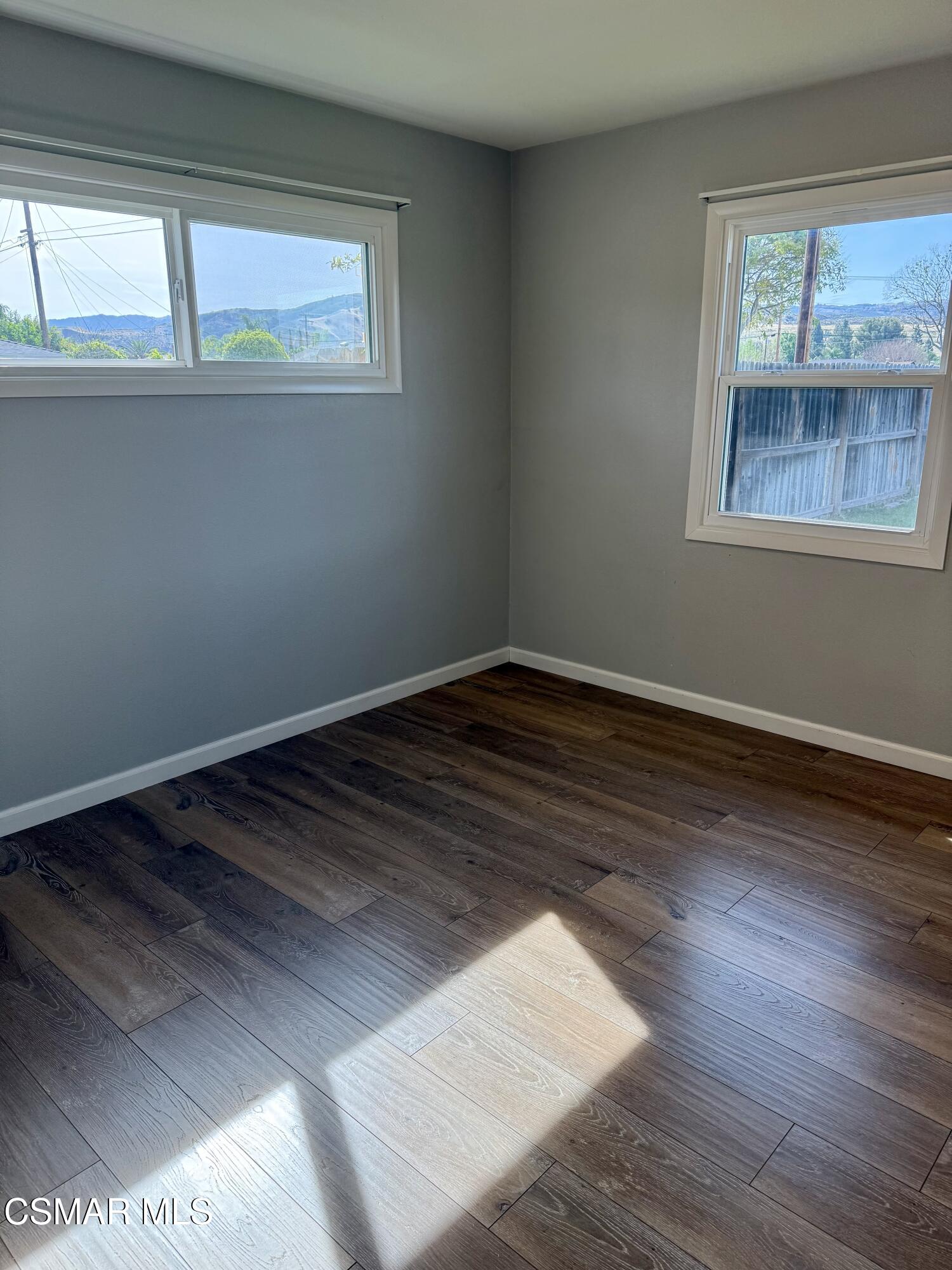 4090 Florence Street Simi Valley, CA 93063 - Photo 13 of 16 a view of a room with wooden floor and window